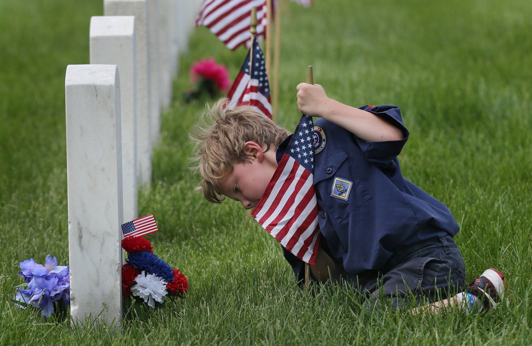 Scouts place flags in Jefferson Barracks on Memorial Day